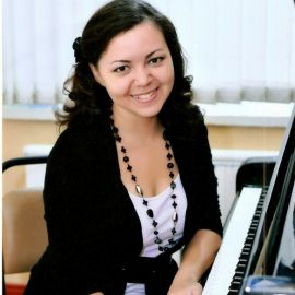 Алина Альматова